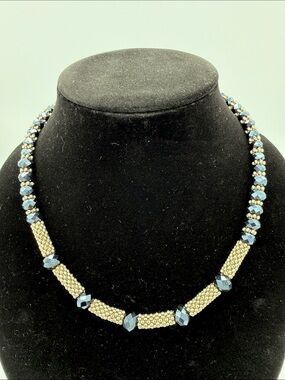 Handcrafted Gold Beaded Necklace with Blue Crystal Accents